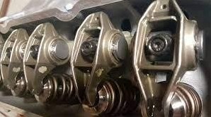Rocker arms and valve springs assembled on a cylinder head