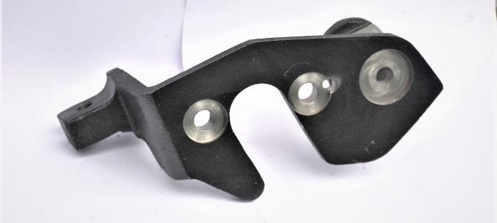 Machined casting bracket showing spot faced holes and datum machined faces