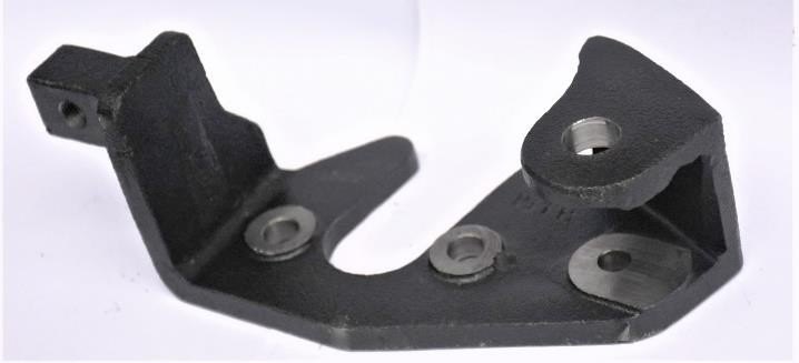Machined shell moulded casting bracket with spot faced mounting holes